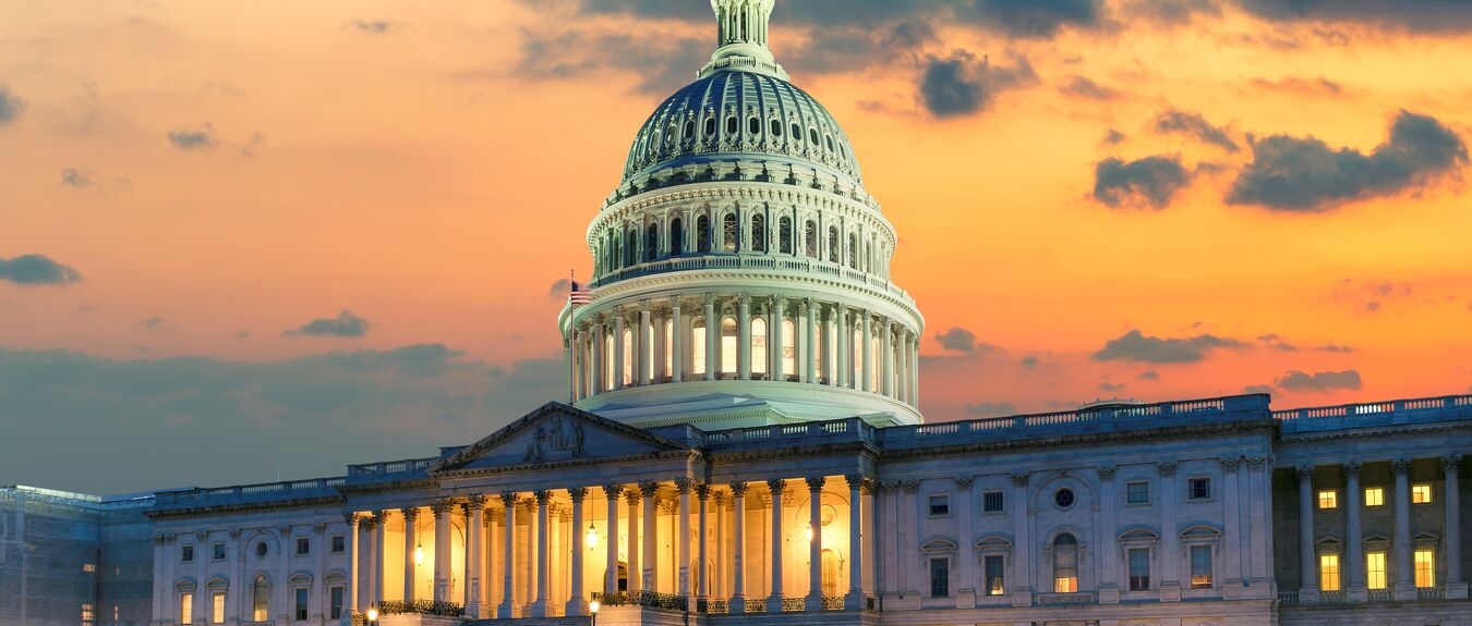 The United States Capitol Building at sunset in Washington DC, USA.